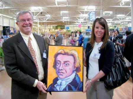 David Holcombe with his portrait of Edward Jenner, father of vaccinations, to be given to Mrs. Jindal, wife of former Governor Jindal of Louisiana